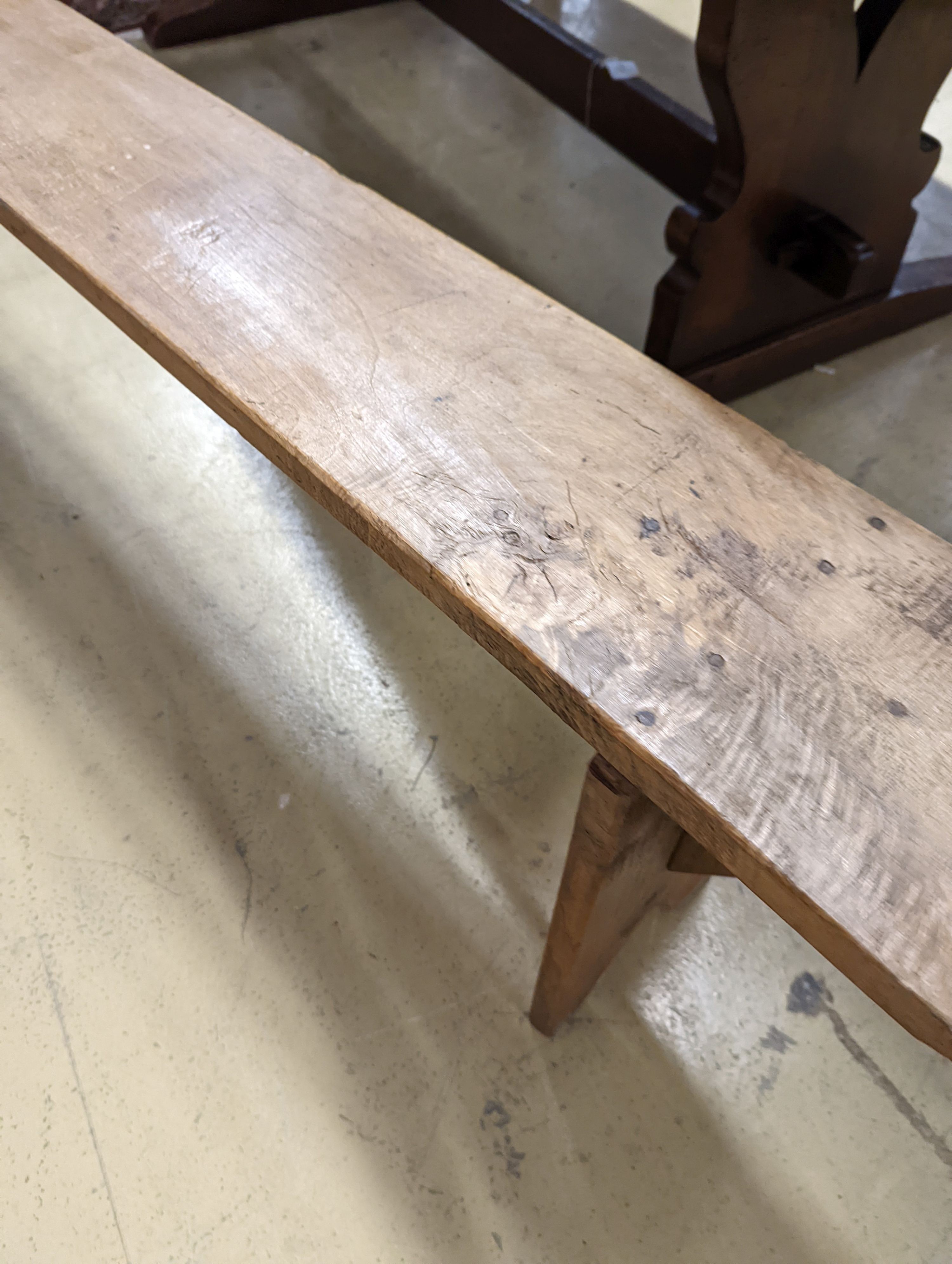 A pair of 19th century pine benches. Length-220cm, Depth-21, Height - 45cm.